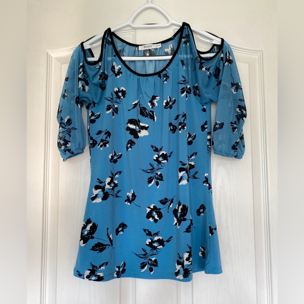 Ricki’s blouse.